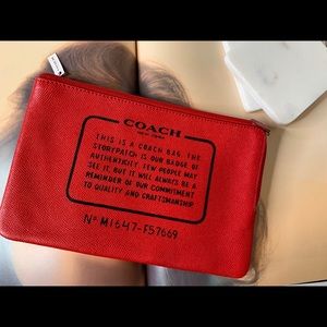Coach story pouch